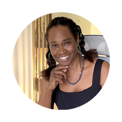 Woman with braided hair smiling in a circular portrait