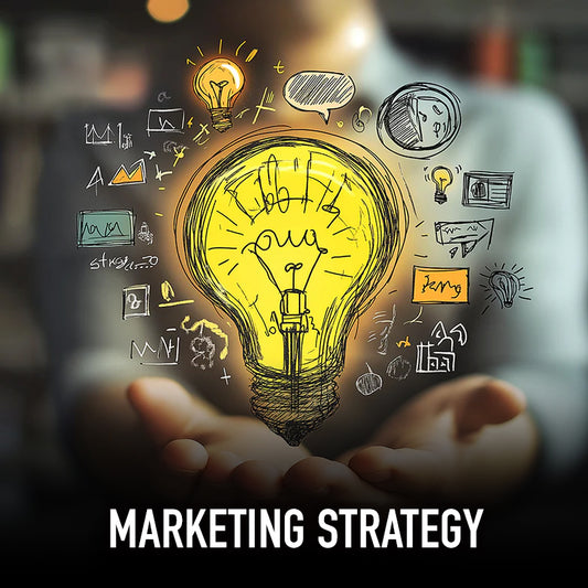 Hands holding a glowing lightbulb sketch concept over blurred background—representing innovation and strategic ideas.